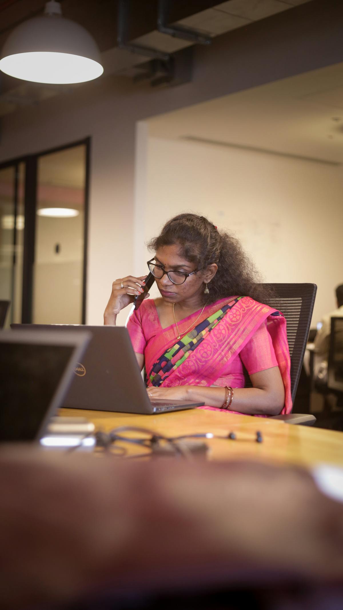 Indian woman taking a mindful pause at work
